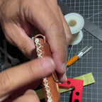 The cross-stitched side of the Clipper Stitch